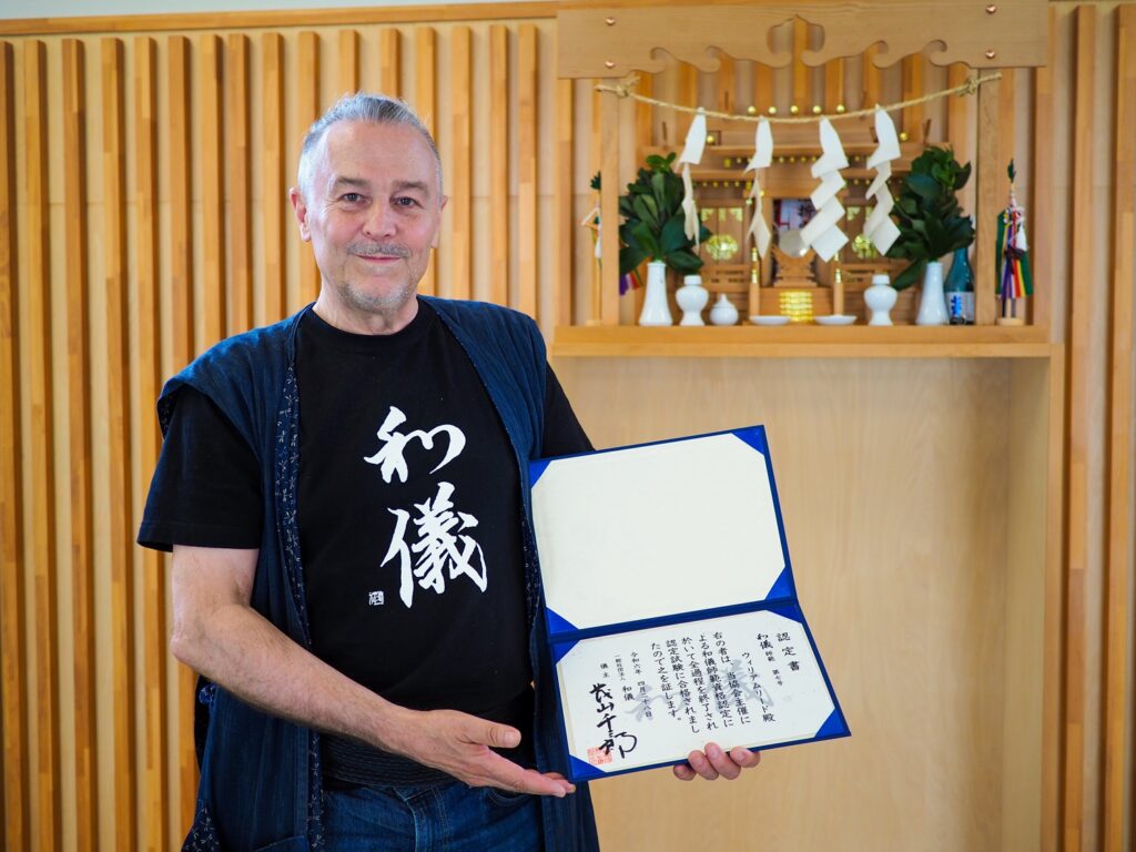 Professor William Reed holds his Shihan certificate in WAGI, a health method based in Kyogen.