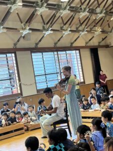 Two iCLA students perform for Yamanashi Gakuin kindergartners for Tanabata.