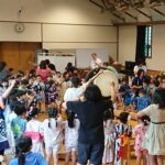 iCLA students dancing together with Yamanashi Gakuin Kindergarten children for the Tanabata Festival.