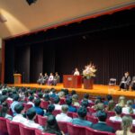 Yamanashi Gakuin University's President Takako Aoyama gives her welcome speech to new students at the Memorial Hall.