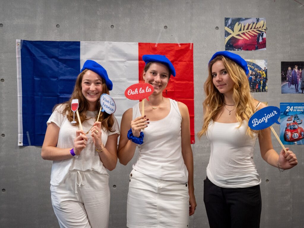 French iCLA Students set up a colorful booth decorated with French icons for iCLA's Diversity Day.